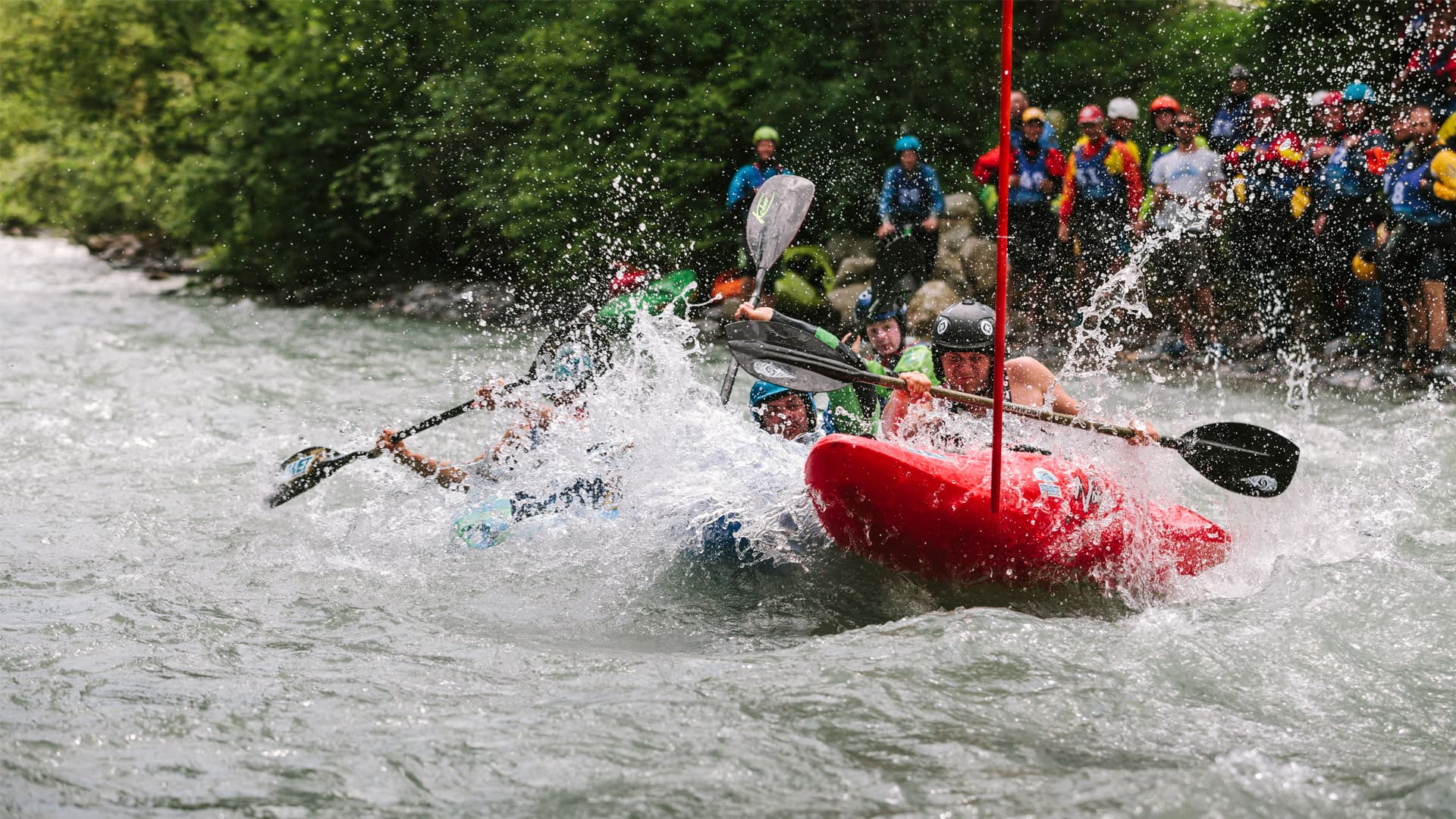 Kayakers racing through whitewater rapids on the Ötztaler Ache